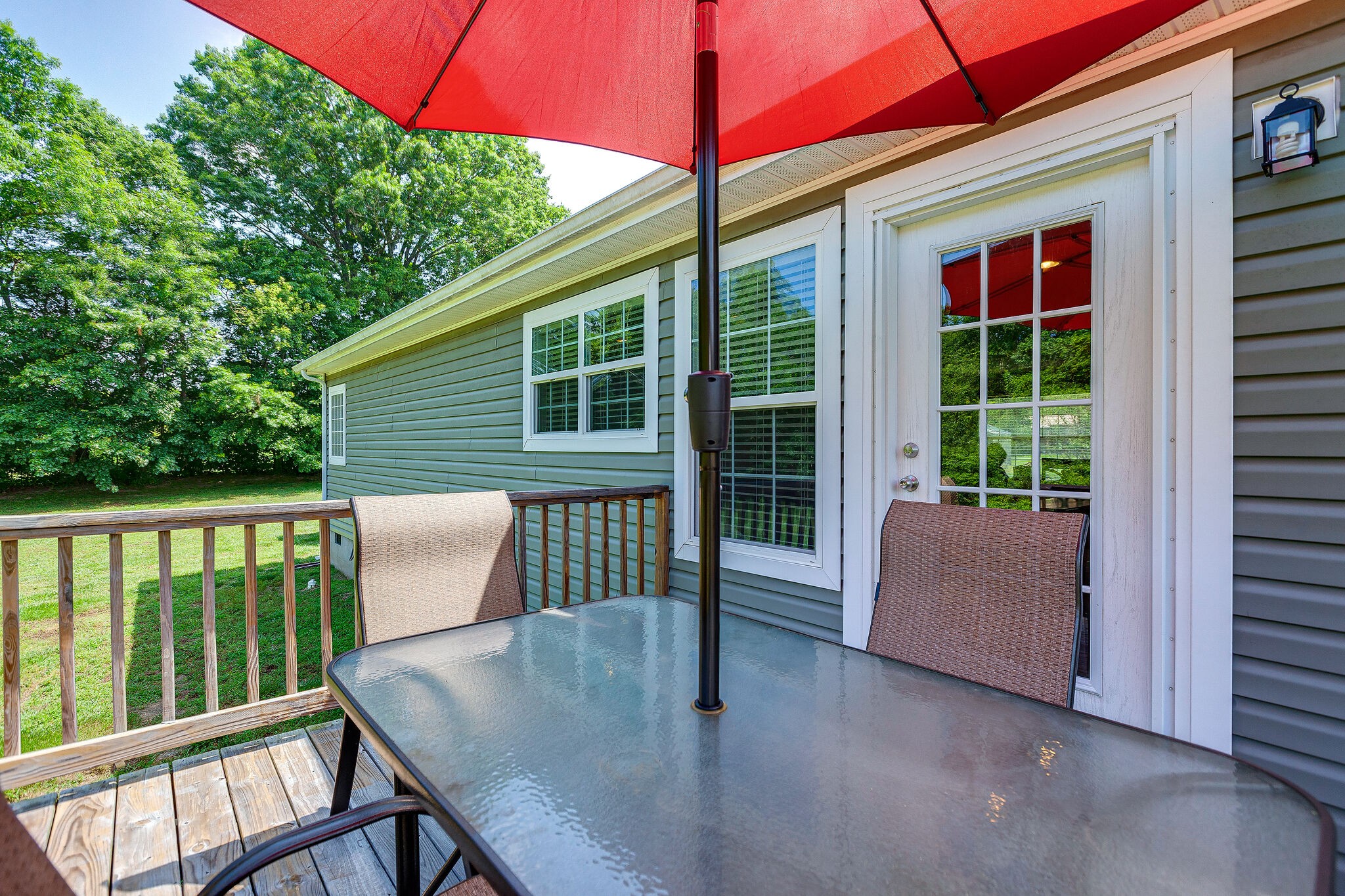 3349 Mahlon Moore Road Spring Hill, TN 37174 - Photo 24 of 28 a view of backyard with deck and outdoor seating