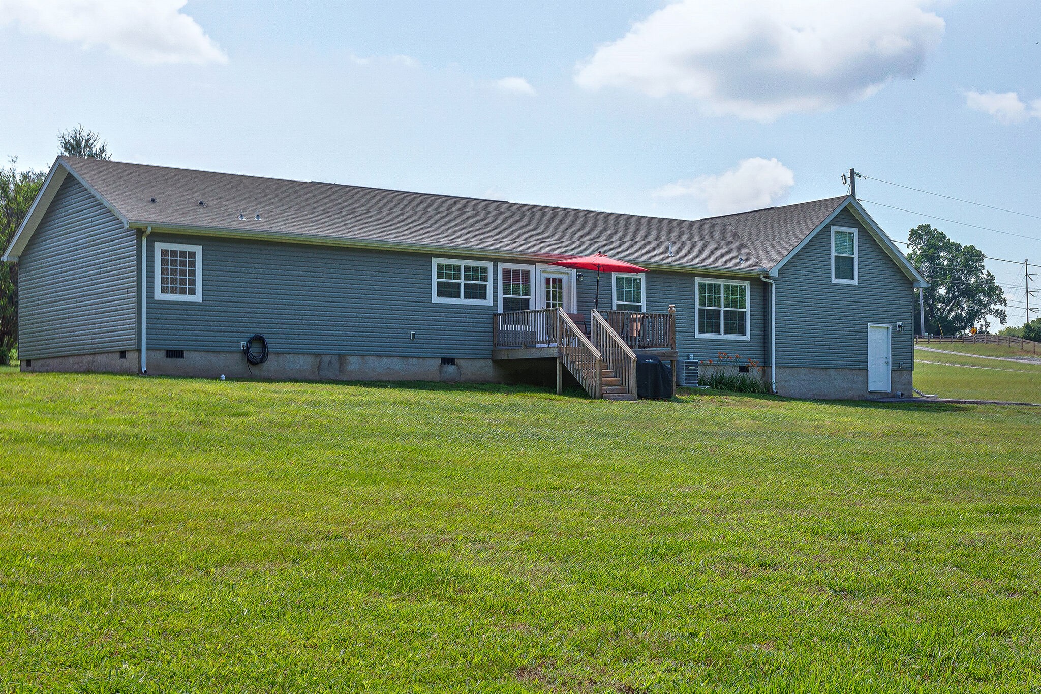 3349 Mahlon Moore Road Spring Hill, TN 37174 - Photo 25 of 28 a front view of house with yard and garage