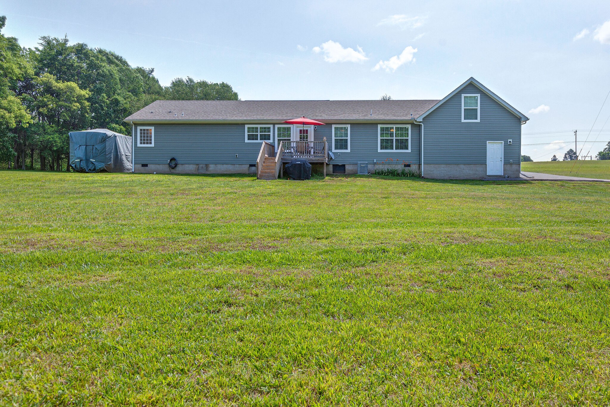 3349 Mahlon Moore Road Spring Hill, TN 37174 - Photo 26 of 28 a front view of a house with a garden