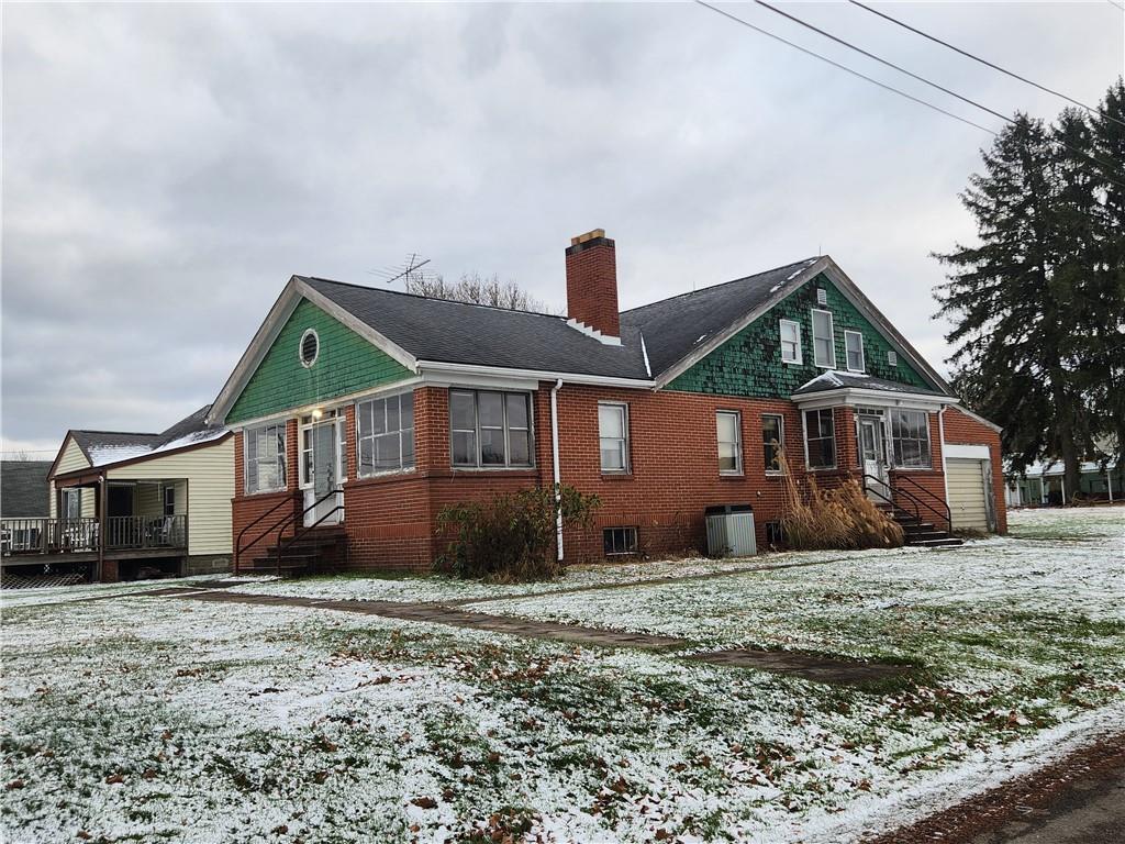 1100 Old State Road Apollo, PA 15613 - Photo 2 of 16 a front view of a house with a yard