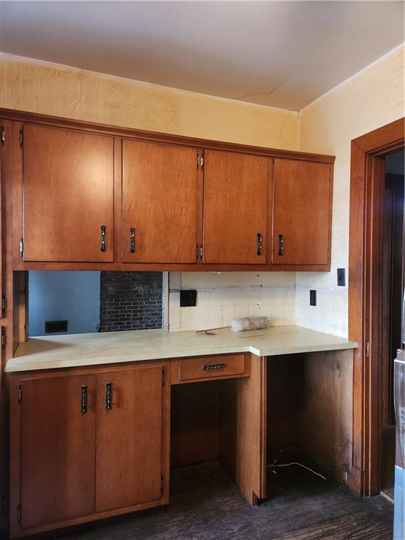 1100 Old State Road Apollo, PA 15613 - Photo 4 of 16 a kitchen with a sink cabinets and wooden floor