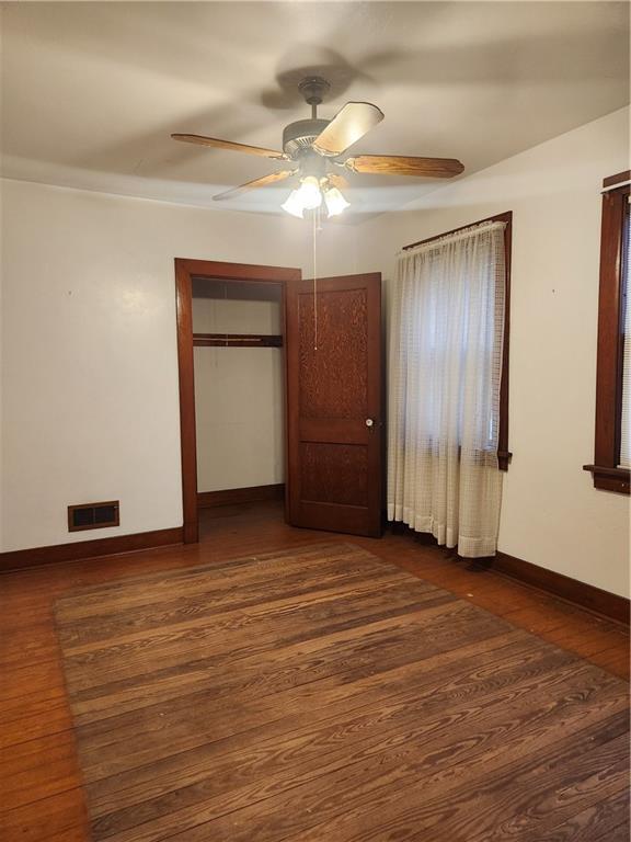 1100 Old State Road Apollo, PA 15613 - Photo 9 of 16 an empty room with wooden floor and windows