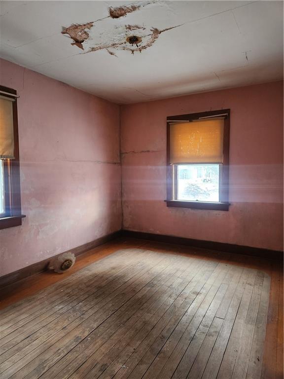 1100 Old State Road Apollo, PA 15613 - Photo 10 of 16 an empty room with wooden floor and windows