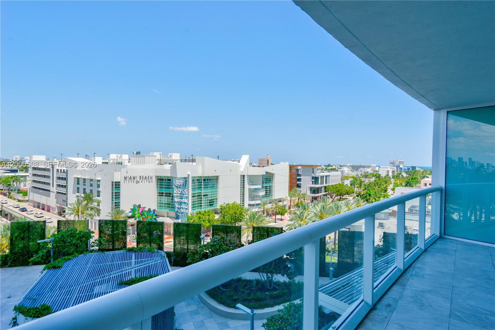 450 Alton Road, Unit 806 Miami Beach, FL 33139 - Photo 2 of 23 a view of a city from a balcony