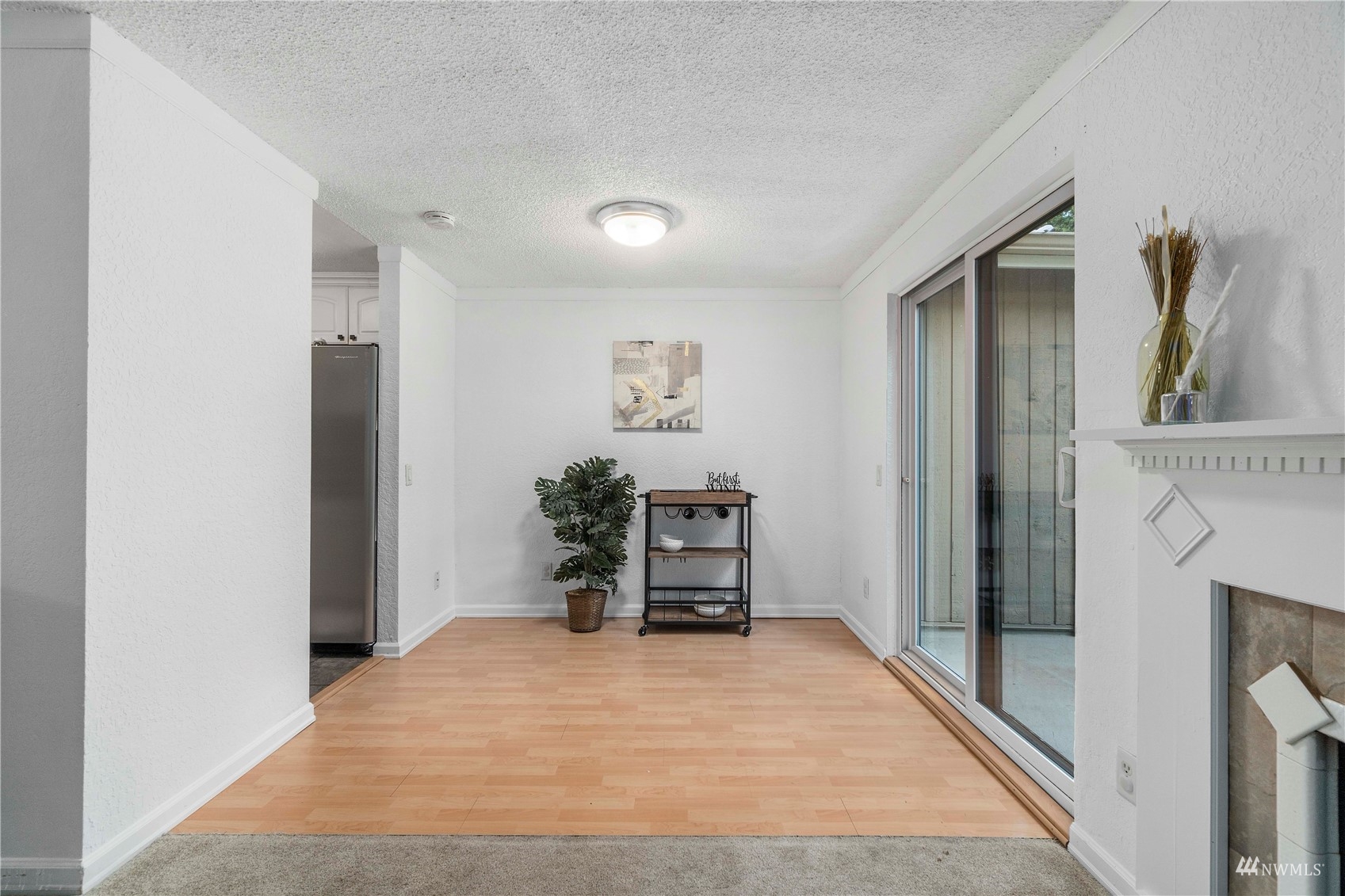 1800 Grant Avenue South, Unit D2 Renton, WA 98055 - Photo 11 of 23 a bedroom with a bed and a table