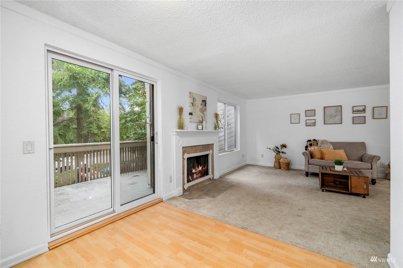 1800 Grant Avenue South, Unit D2 Renton, WA 98055 - Photo 8 of 23 a living room with furniture and a fireplace
