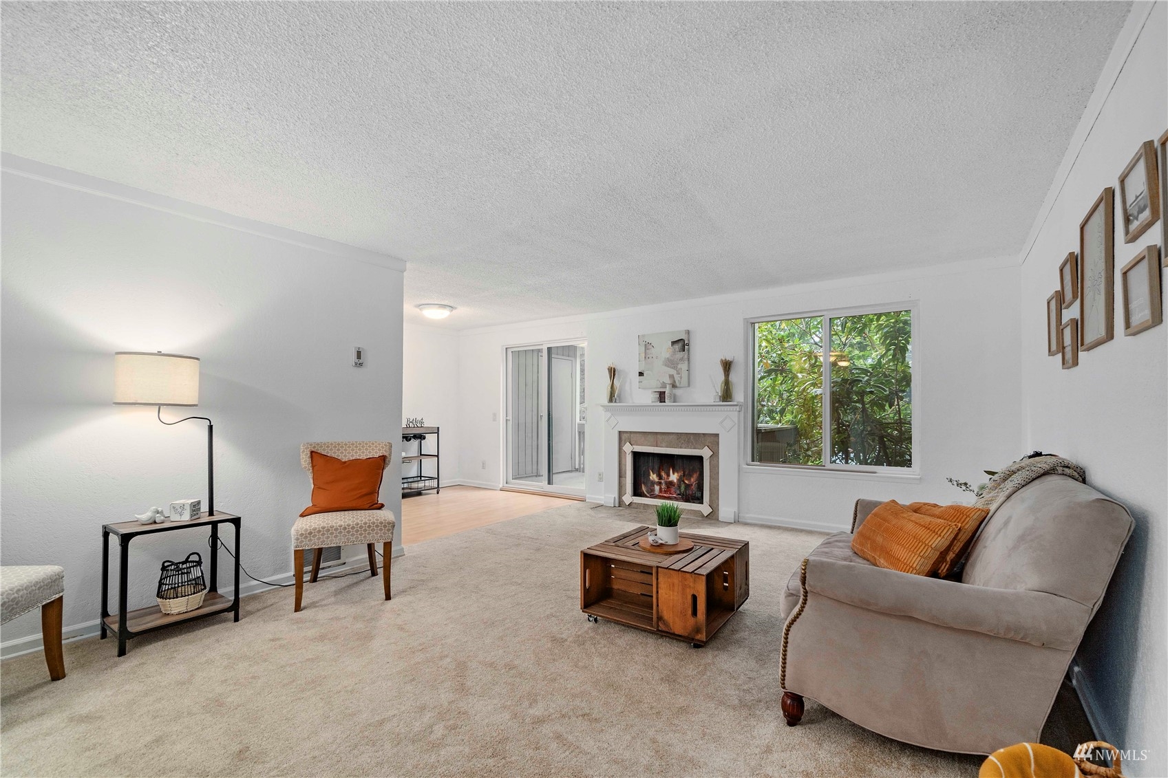 1800 Grant Avenue South, Unit D2 Renton, WA 98055 - Photo 10 of 23 a living room with furniture and a fireplace