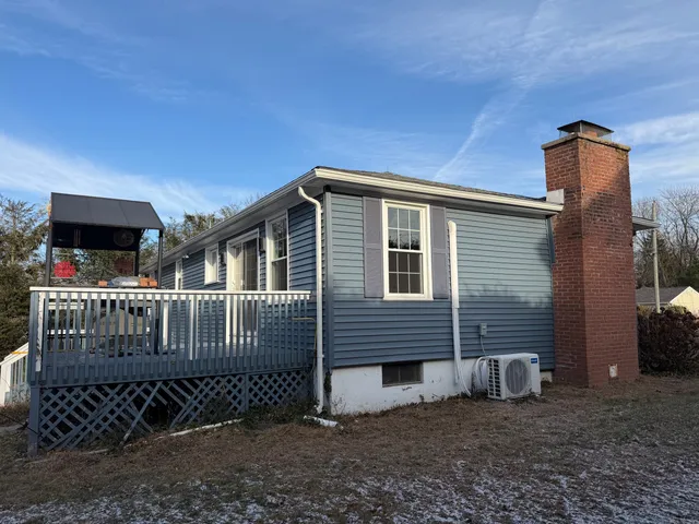 a view of a house with a deck