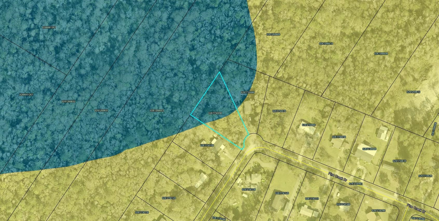 5900 Pine Creek Drive St. Augustine, FL 32092 - Photo 2 of 5 a view of a big yard with plants and wooden fence