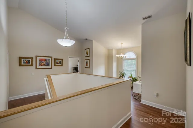 a room with a refrigerator and a sink