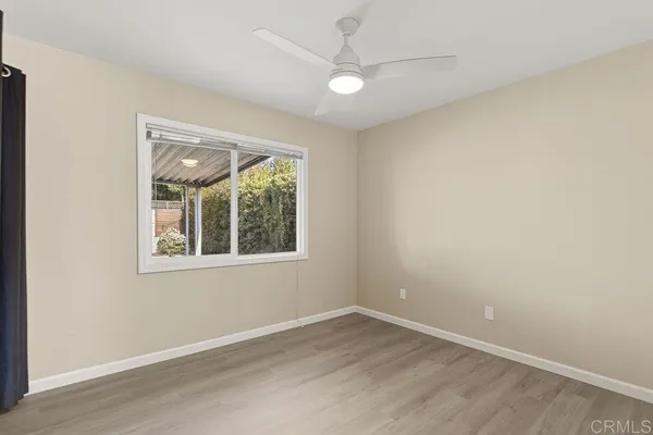 a view of a livingroom with furniture and a garage