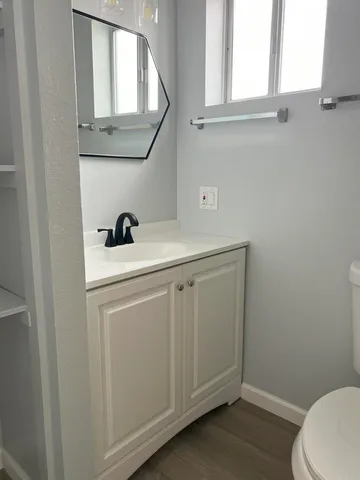 a view of a kitchen with a sink