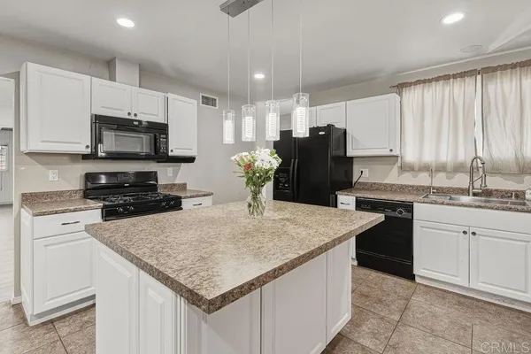 a bathroom with a sink toilet and vanity