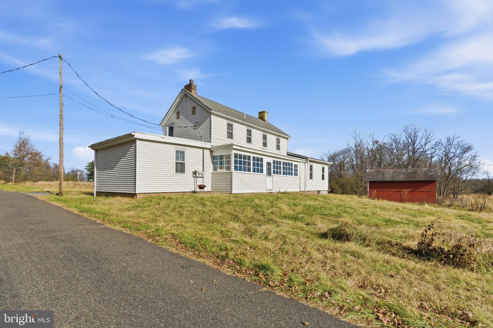 19 Thatcher Road Frenchtown, NJ 08825 - Photo 2 of 41 a front view of a house with a yard