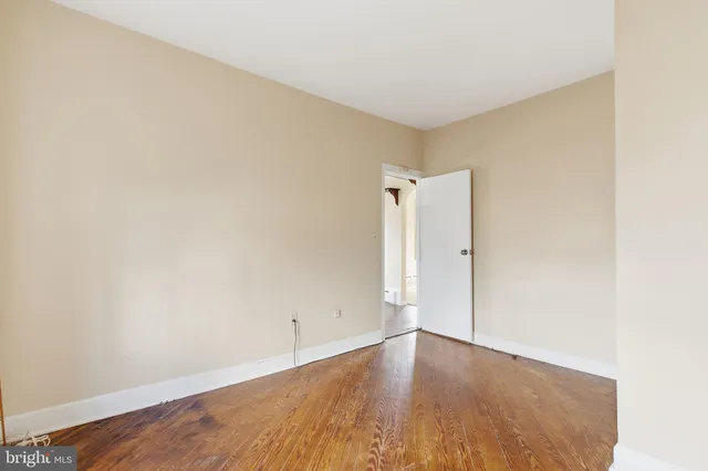 a bathroom with a sink a mirror and shower