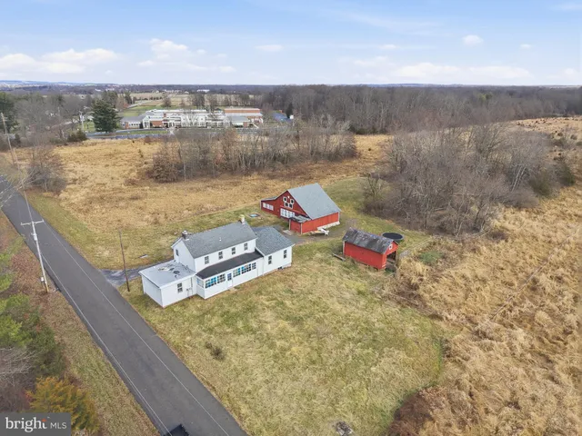 a view of door and kitchen