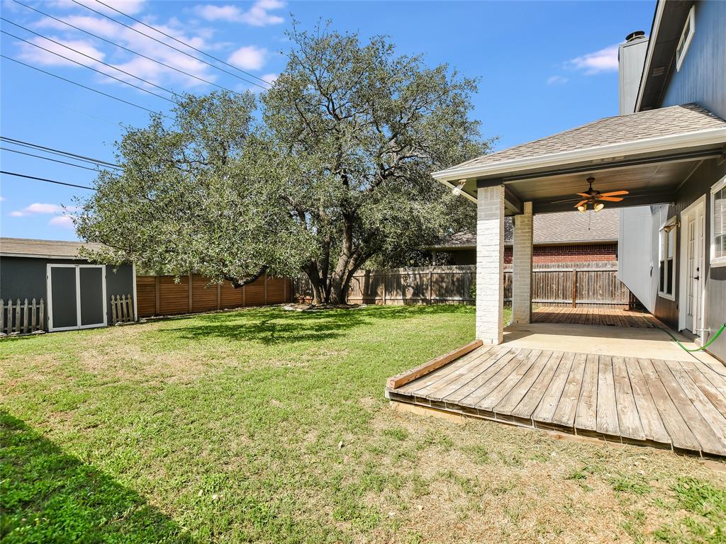 3031 Bent Tree Loop Round Rock, TX 78681 - Photo 6 of 28 Large backyard with a shed & covered patio.