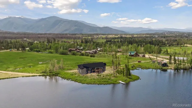 a view of a lake with a mountain in the background