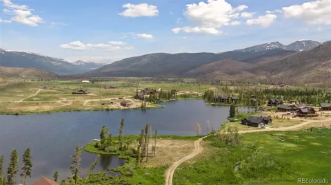 a view of an ocean and a mountain