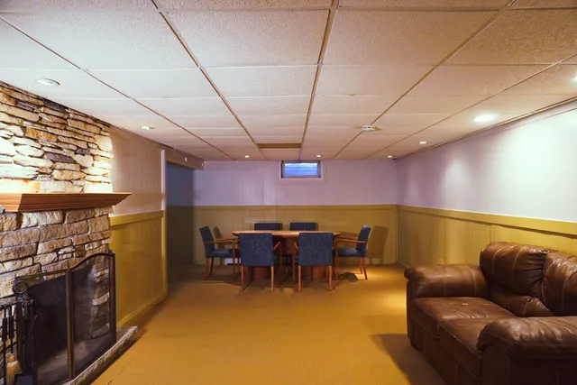 a view of a livingroom with furniture window and outside view