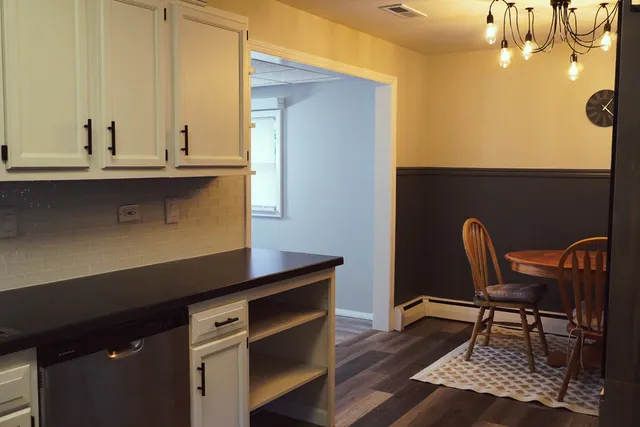 a view of a workspace with furniture