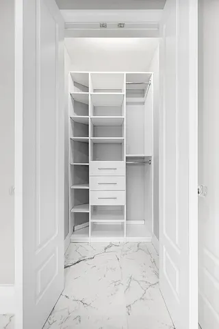 a view of an empty walk in closet