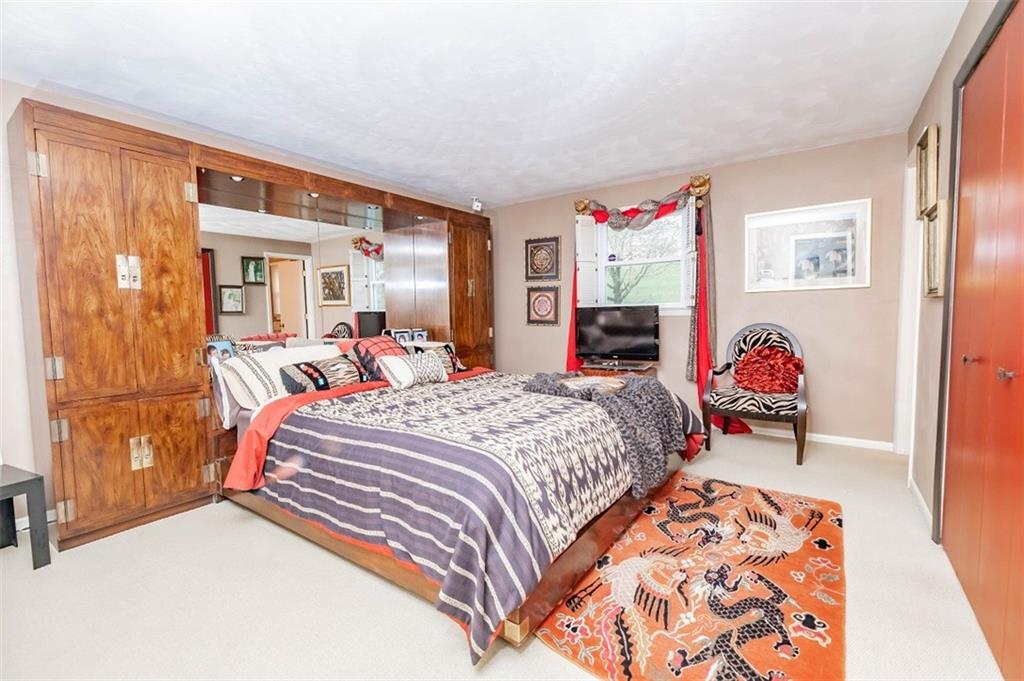2740 Rebecca Street Indiana, PA 15701 - Photo 14 of 25 a bed room with a bed and a couch