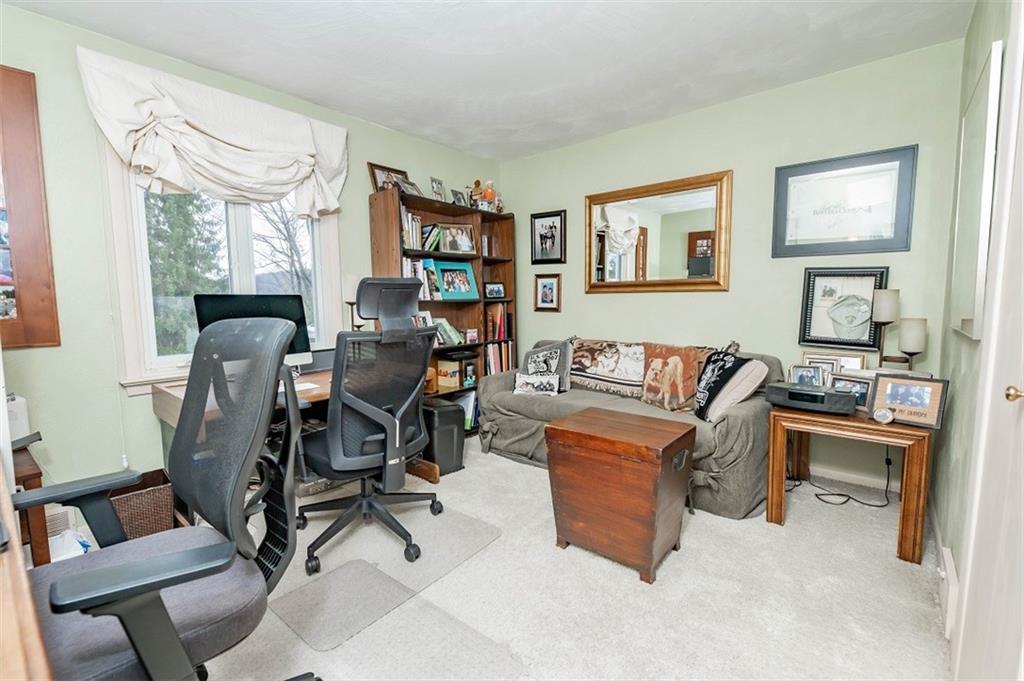 2740 Rebecca Street Indiana, PA 15701 - Photo 19 of 25 a work room with furniture and a bookshelf