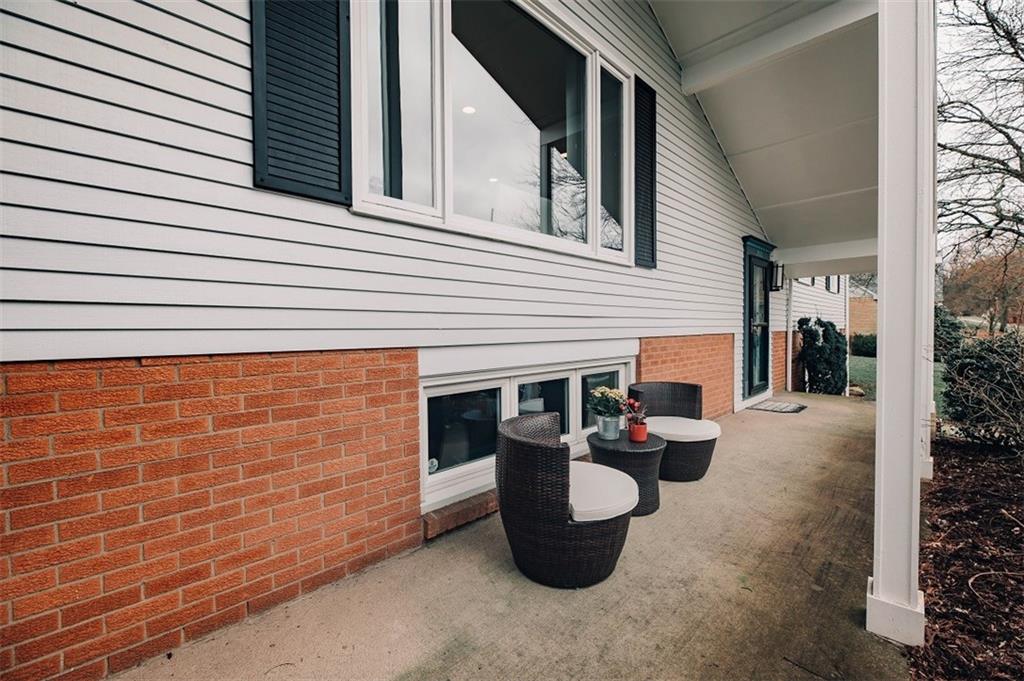 2740 Rebecca Street Indiana, PA 15701 - Photo 2 of 25 a view of a patio with dining table and chairs