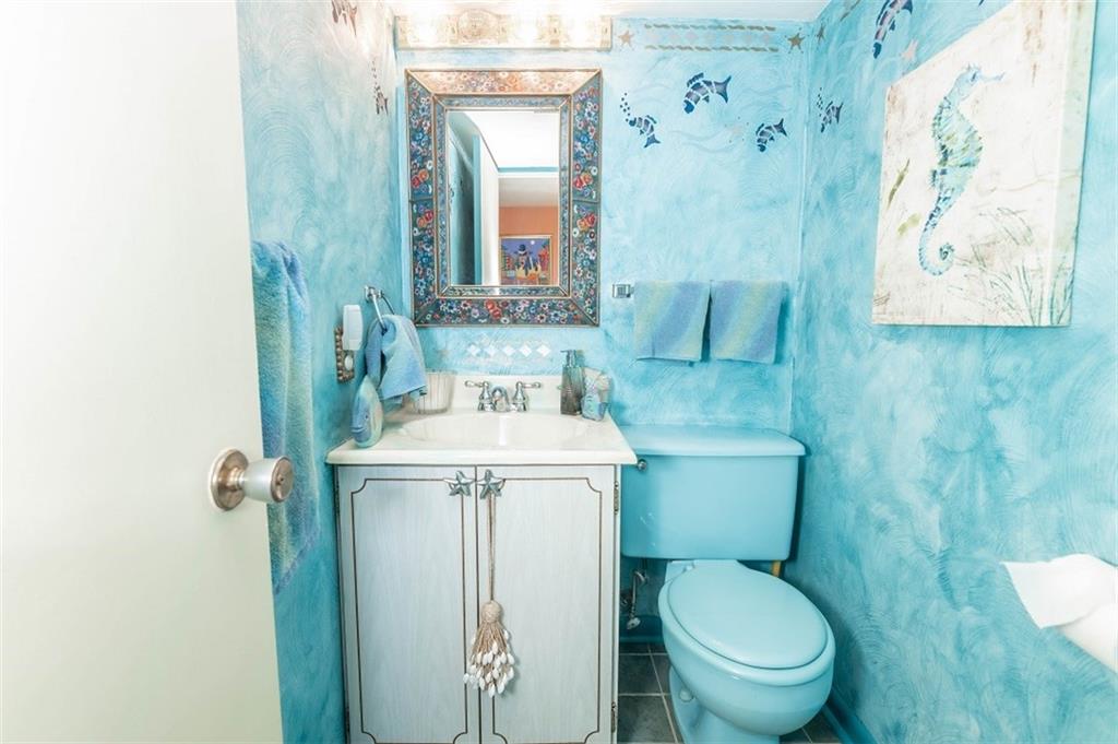 2740 Rebecca Street Indiana, PA 15701 - Photo 23 of 25 a bathroom with a granite countertop toilet sink and mirror