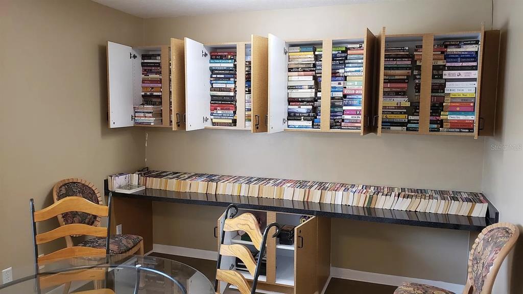 1830 Long Iron Drive, Unit 701 Rockledge, FL 32955 - Photo 13 of 18 a view of a chair and table in a room