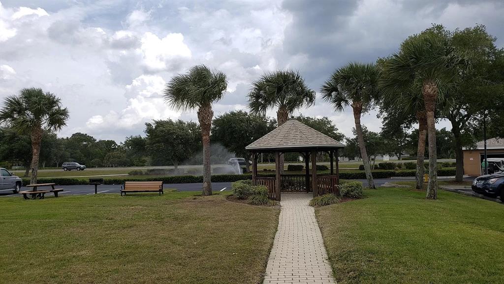 1830 Long Iron Drive, Unit 701 Rockledge, FL 32955 - Photo 15 of 18 a view of outdoor space yard and patio