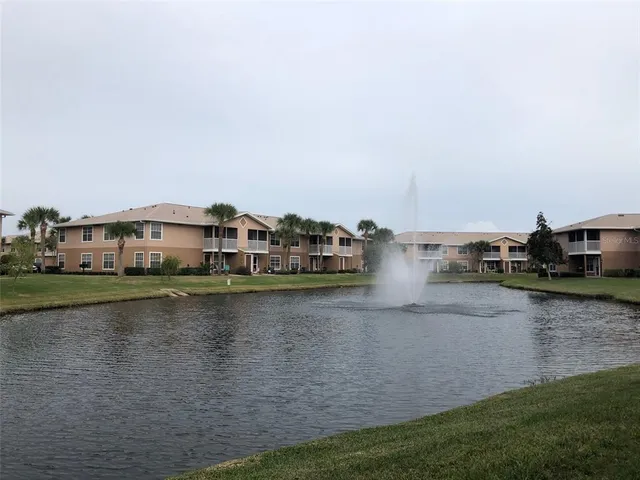 a view of a lake with houses