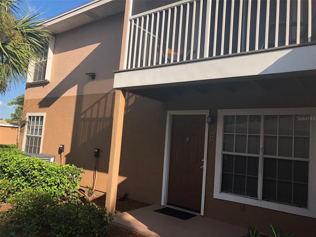 1830 Long Iron Drive, Unit 701 Rockledge, FL 32955 - Photo 2 of 18 a front view of a house with a window