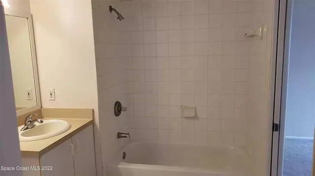 a bathroom with a sink and a tub