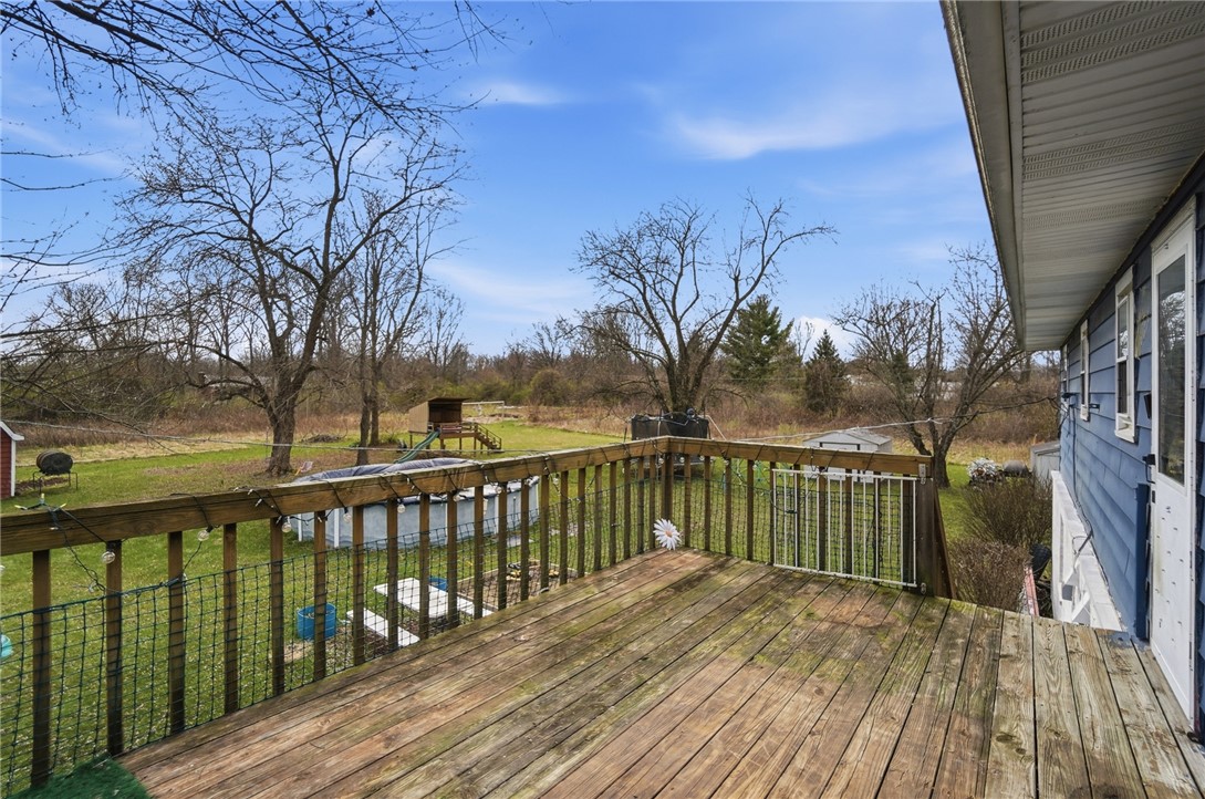 290 Ginghamsburg Road Tipp City, OH 45371 - Photo 41 of 49 This spacious deck offers a tranquil retreat with expansive views of the surrounding natural landscape.