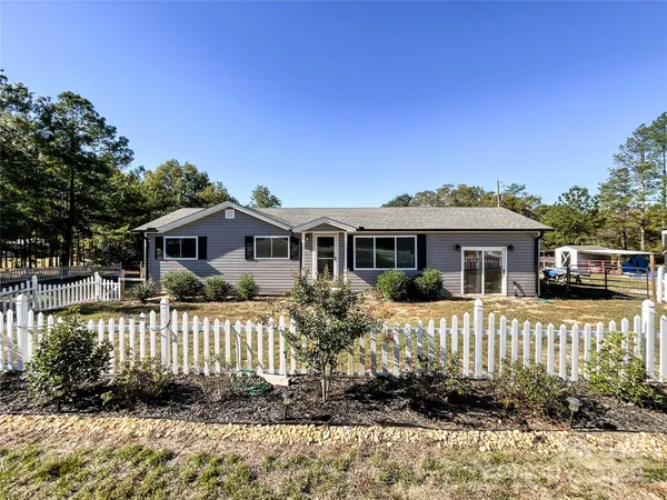 a front view of a house with a porch