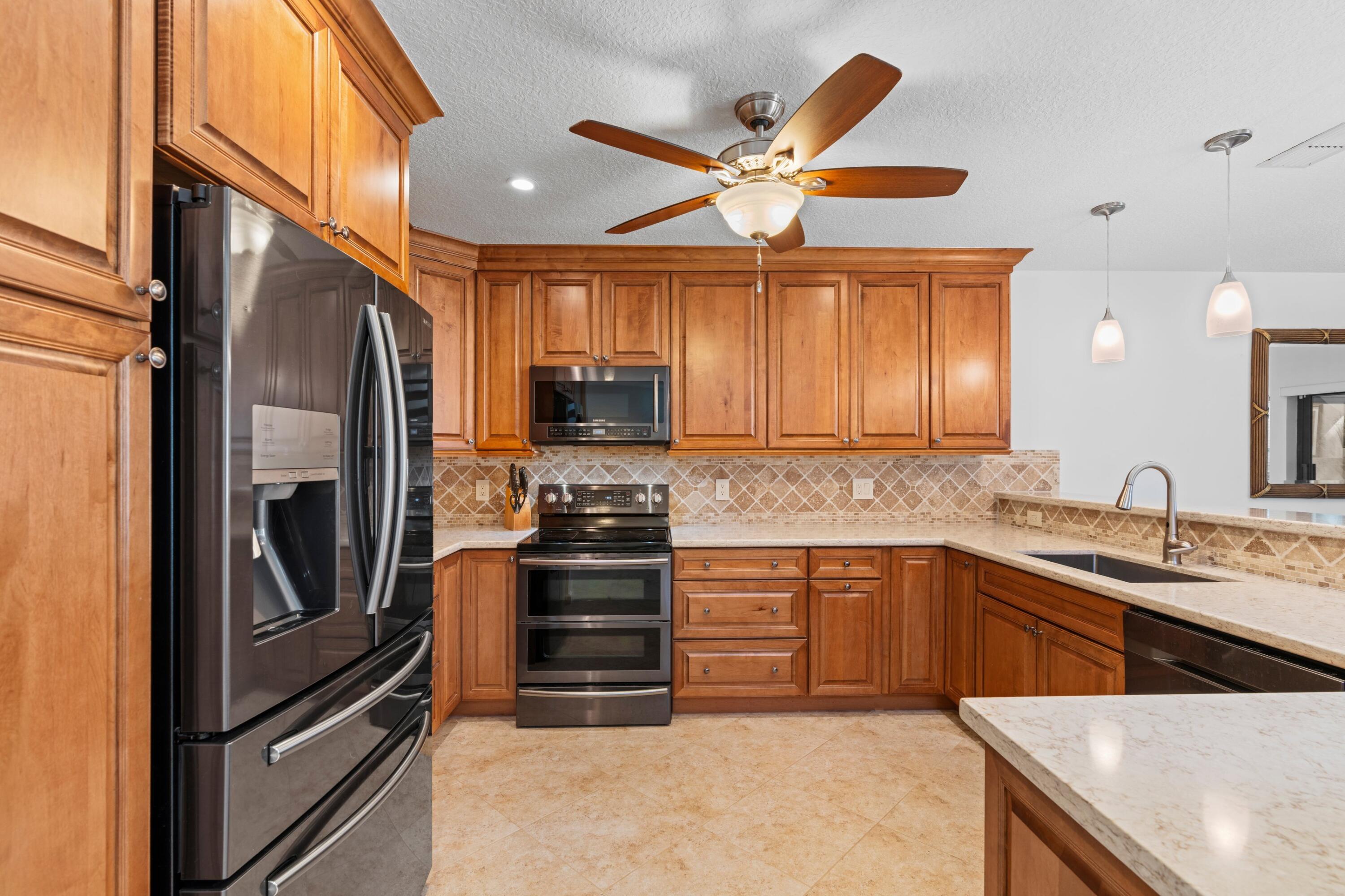 6079 Glendale Drive Boca Raton, FL 33433 - Photo 10 of 49 Kitchen