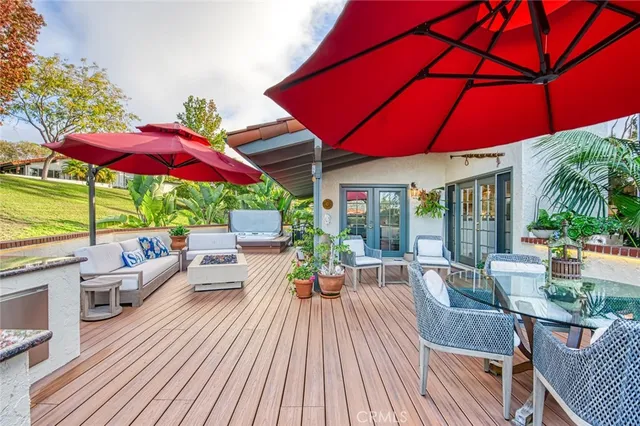a bedroom with a bed two lamps and a dresser