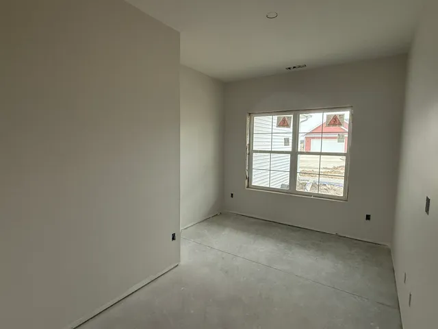 an empty room with a window