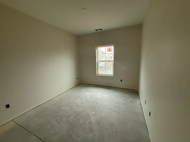 a view of a room with windows