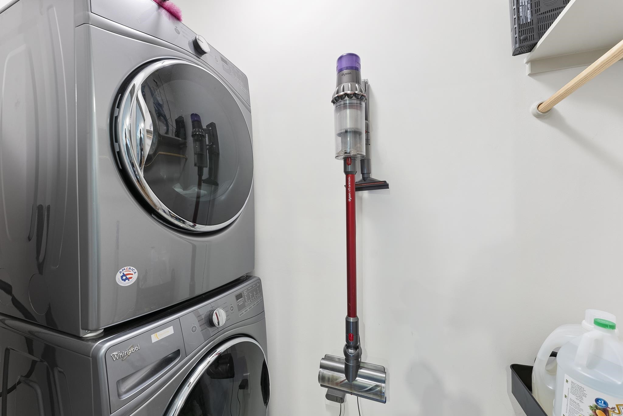 1300 St Marys Street, Unit 306 Raleigh, NC 27605 - Photo 25 of 30 a utility room with dryer and washer