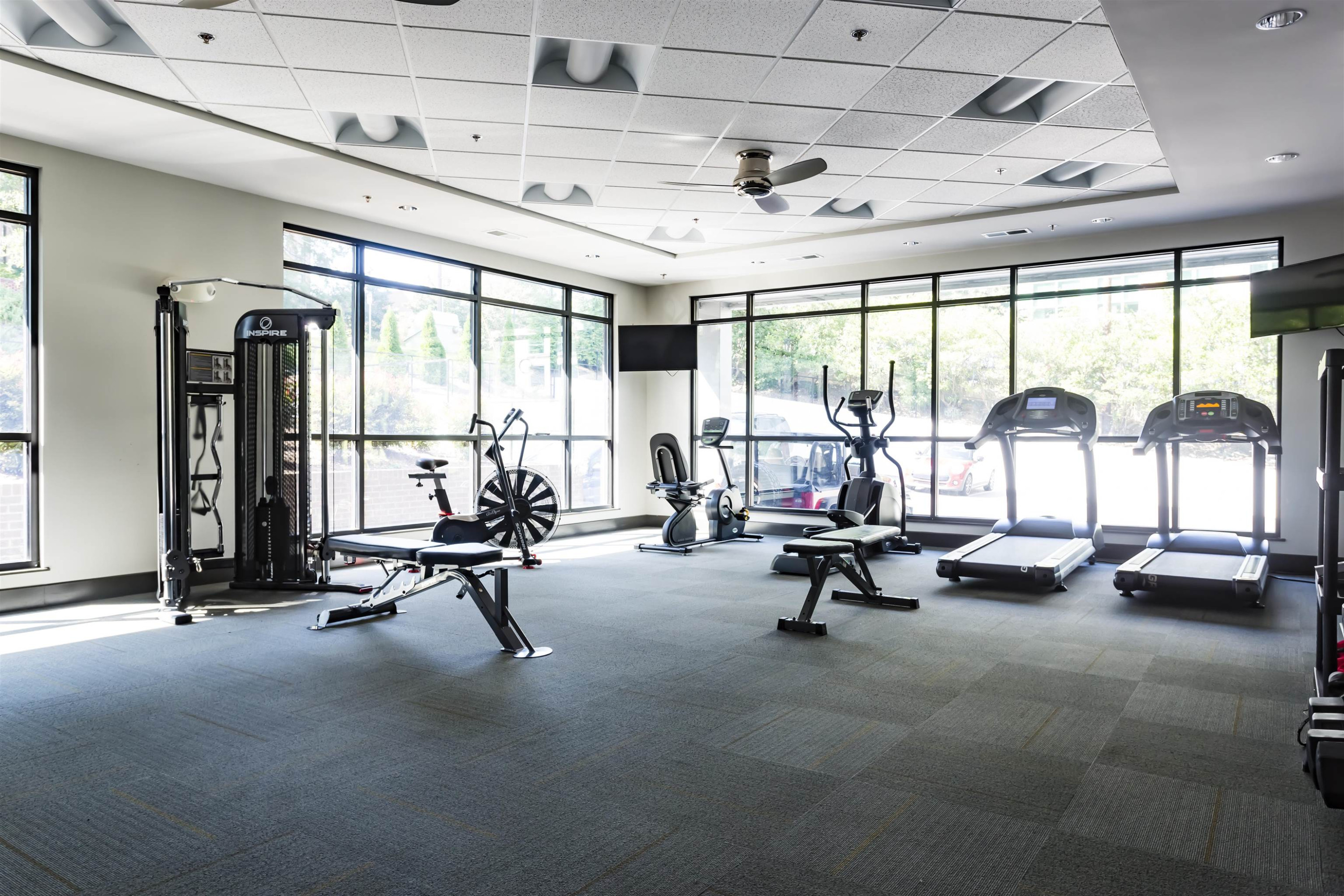 1300 St Marys Street, Unit 306 Raleigh, NC 27605 - Photo 26 of 30 a view of a room with gym equipment