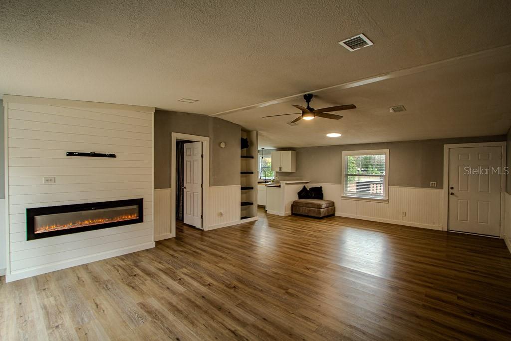 448 Southwest Central Terrace Fort White, FL 32038 - Photo 12 of 19 a view of a livingroom with furniture wooden floor and windows