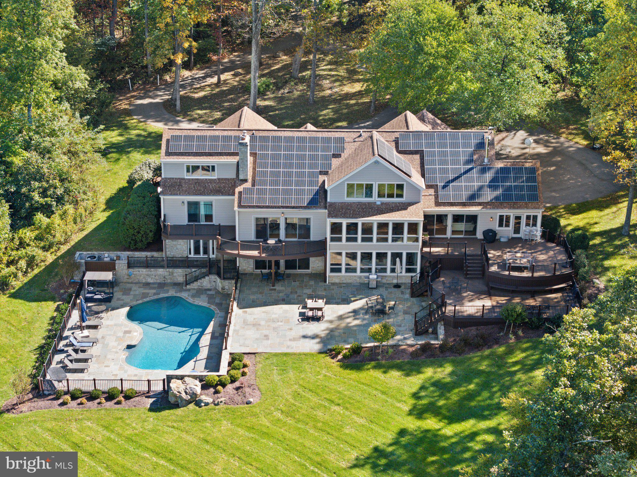a view of a house with backyard porch and patio