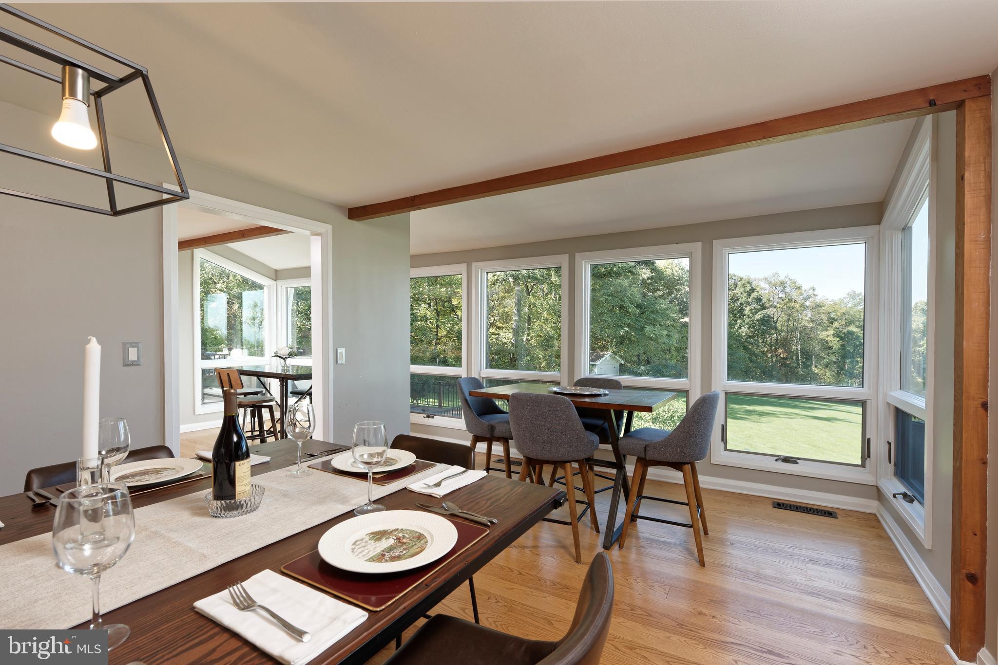 20615 Blue Ridge Mountain Road Paris, VA 20130 - Photo 11 of 80 a view of a dining room with furniture and wooden floor