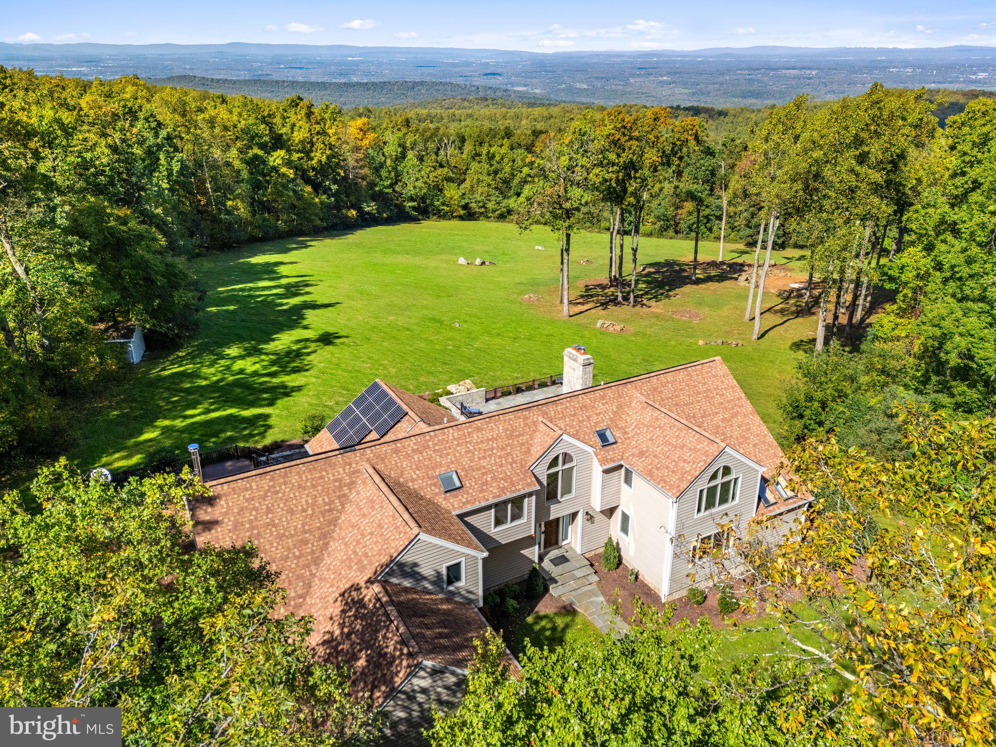 20615 Blue Ridge Mountain Road Paris, VA 20130 - Photo 2 of 80 an aerial view of a house with a yard