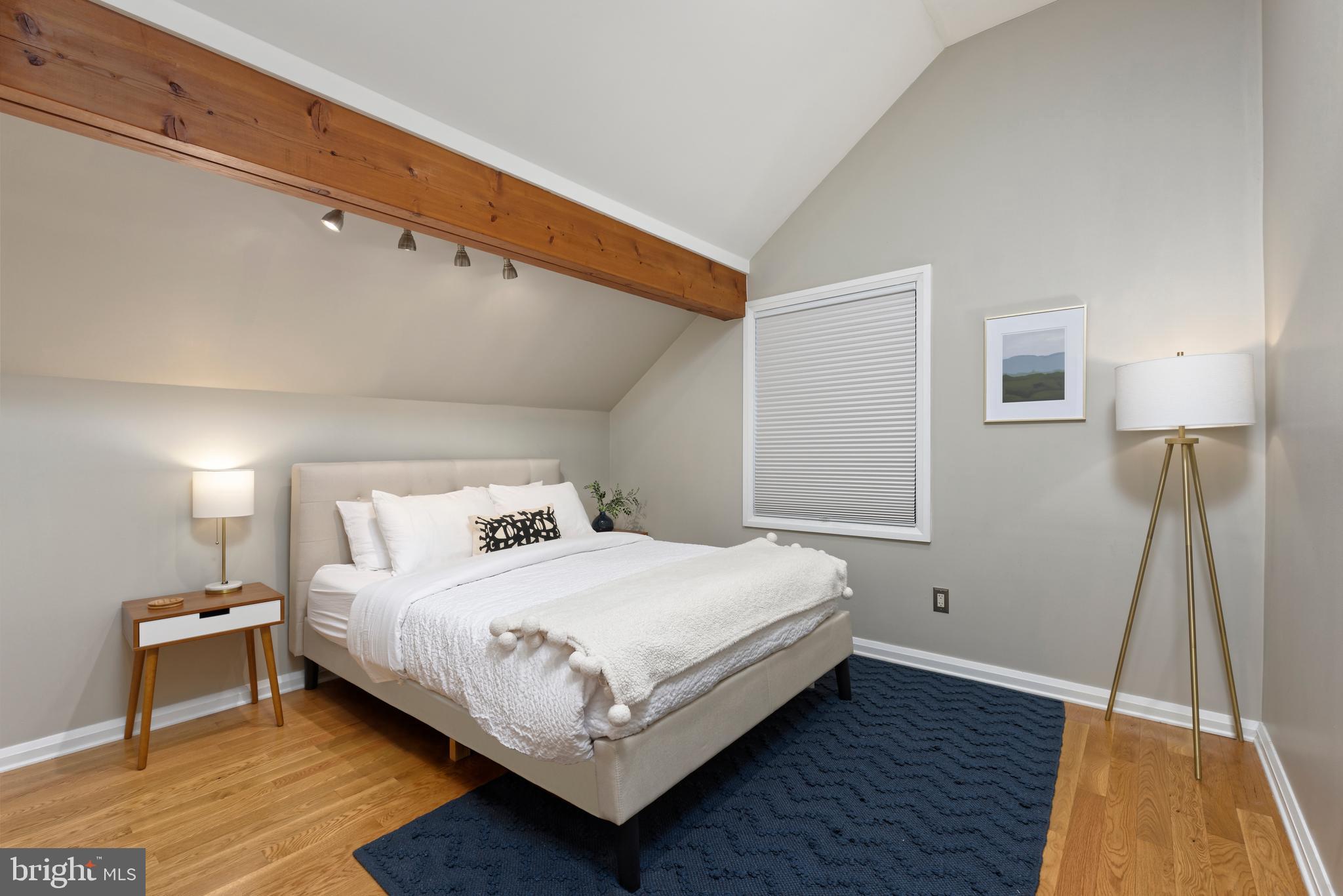 20615 Blue Ridge Mountain Road Paris, VA 20130 - Photo 29 of 80 a bedroom with a bed and a night stand