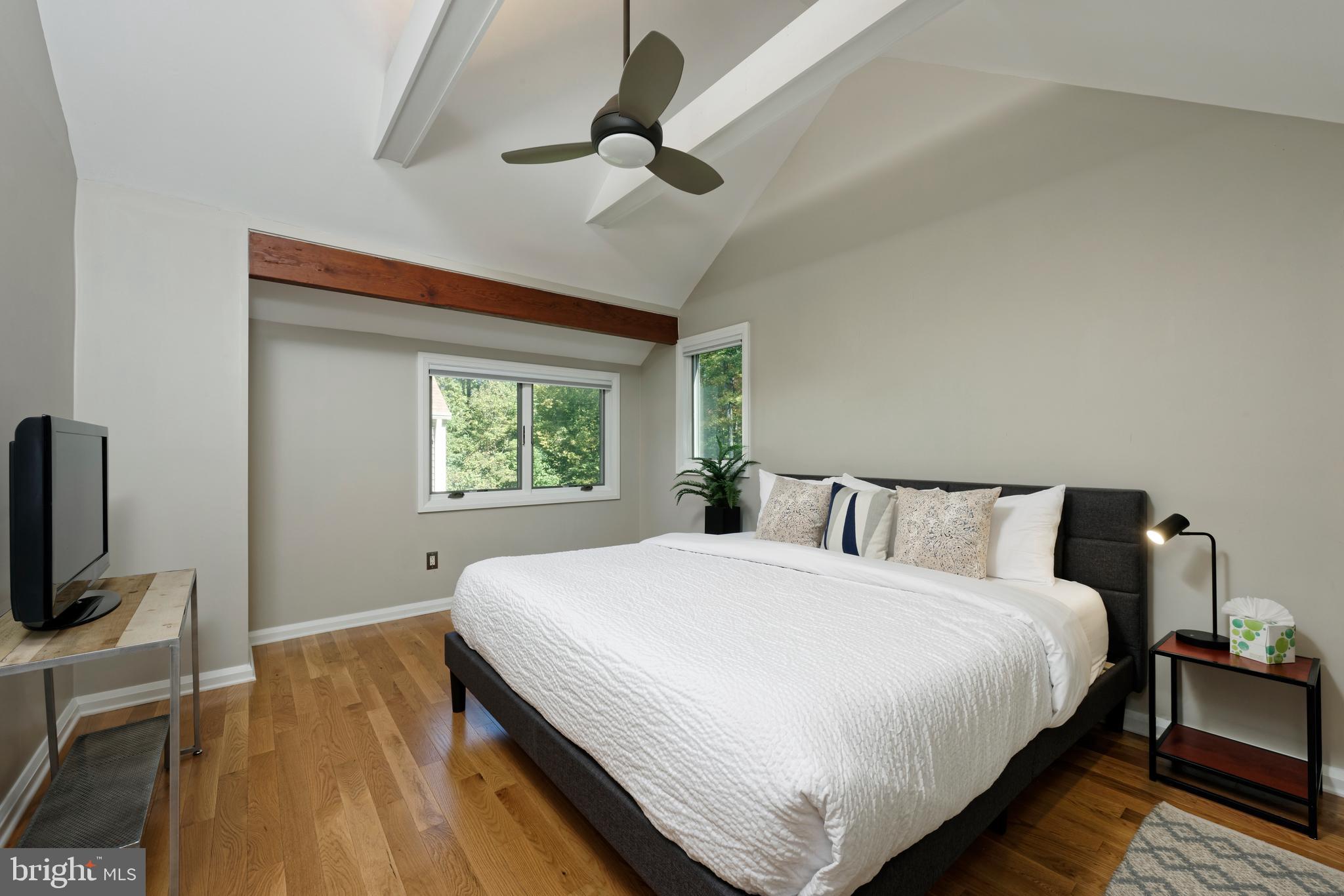 20615 Blue Ridge Mountain Road Paris, VA 20130 - Photo 30 of 80 a bed sitting in a bedroom next to a window