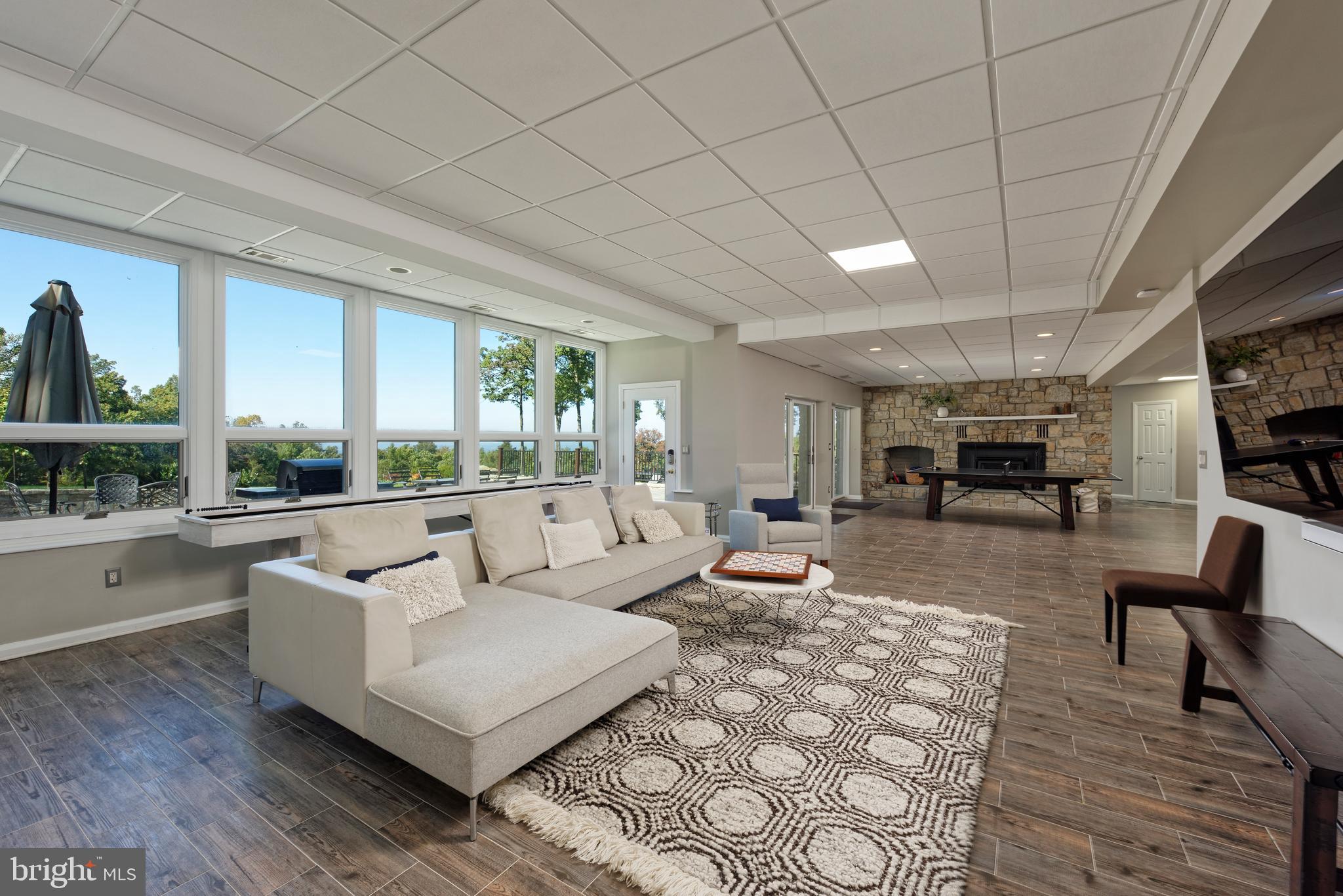 20615 Blue Ridge Mountain Road Paris, VA 20130 - Photo 33 of 80 View of Game Room area with TV & access outside